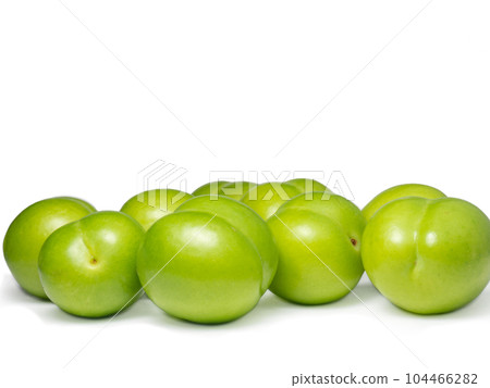 Cherry plum isolate. Fruit background. Preparation of tkemali sauce. Sour, green fruit. One of the varieties of plum. green cherry plum. Cherry plum isolate. Fruit background. Preparation of tkemali sauce. Sour, green fruit. One of the varieties of plum. green cherry plum. 104466282