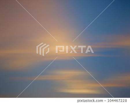 Blur Golden orange sky on top with the evening sunset glow. 104467228