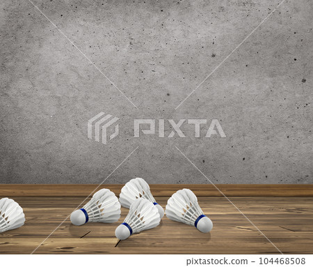 Badminton ball or shuttlecock in room concrete wall texture with wooden floor 104468508