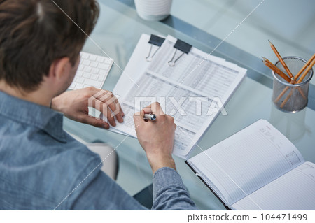 legal expert professional lawyer reading and checking financial documents or insurance contract legal expert professional lawyer reading and checking financial documents or insurance contract 104471499