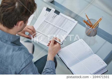 legal expert professional lawyer reading and checking financial documents or insurance contract 104471501