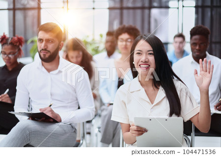 professionals having training class in the office. 104471536