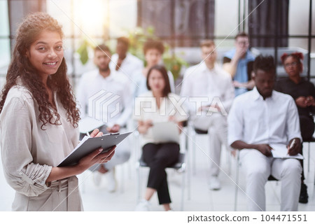 Selective focus of lecturer talking to audience during seminar in conference room 104471551