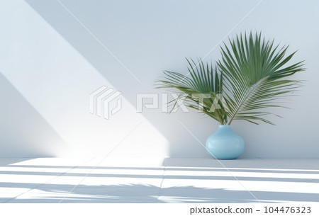 Light blue wall with shade and plant on the floor in a vase Light blue wall with shade and plant on the floor in a vase 104476323