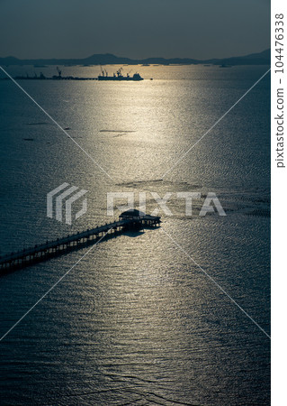 Sriracha Bay Pier and Afternoon Light Chonburi Province, Kingdom of Thailand 104476338