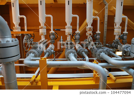 Manifold line of oil and gas production which controlled by program or technician petroleum. The valve function to close and open by programmable by control room for control oil and gas production. Manifold line of oil and gas production which controlled by program or technician petroleum. The valve function to close and open by programmable by control room for control oil and gas production. 104477094