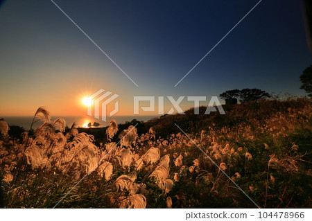 Sunset view of the orange sky and sea 104478966