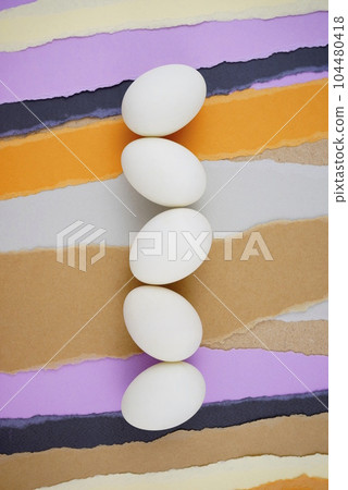 Eggs keto paleo food knolling artwork poster style flat lay on torn paper background. 104480418