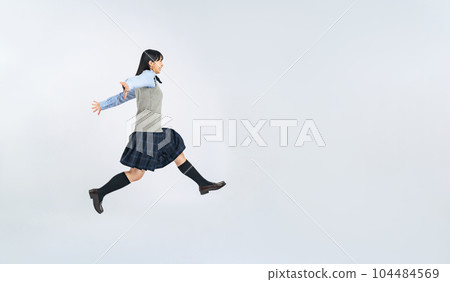 Female student in uniform to jump Female student in uniform to jump 104484569