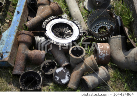 Scrap metal. Various metal products. Garbage made of metal. 104484964