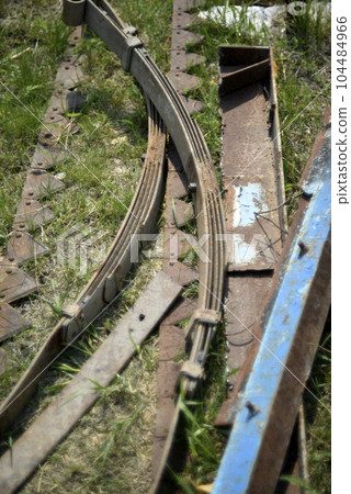 Scrap metal. Various rusty pipes and rods. 104484966