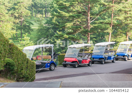 golf cart on the golf course golf cart on the golf course 104485412