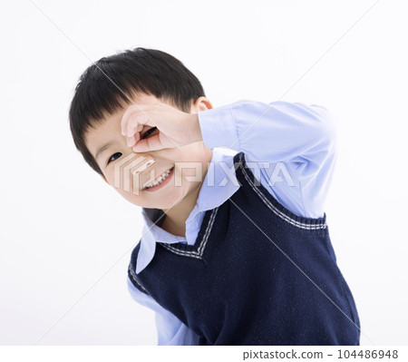 Happy child hand at forehead looking away distance 104486948