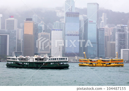 Star ferry sailing through Victoria Bay in Hong Kong Star ferry sailing through Victoria Bay in Hong Kong 104487155