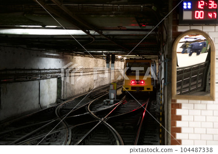 BUDAPEST, HUNGARY - 04 MARCH 2019: Interior view of a retro style subway station in old quarter of Budapest BUDAPEST, HUNGARY - 04 MARCH 2019: Interior view of a retro style subway station in old quarter of Budapest 104487338
