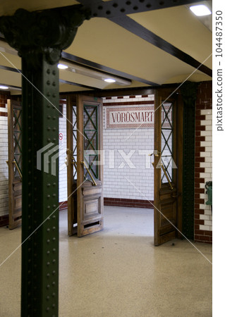 BUDAPEST, HUNGARY - 04 MARCH 2019: Interior view of a retro style subway station in old quarter of Budapest BUDAPEST, HUNGARY - 04 MARCH 2019: Interior view of a retro style subway station in old quarter of Budapest 104487350