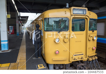 Local train female conductor 104487533
