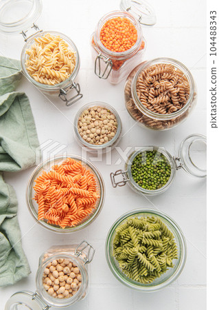 A variety of fusilli pasta from different types of legumes. Gluten-free pasta. A variety of fusilli pasta from different types of legumes. Gluten-free pasta. 104488343