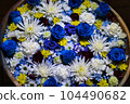 Blue flowers floating on the water 104490682