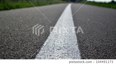 Road ahead with white line 104491173