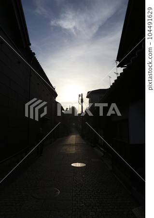 Koedo Kawagoe cityscape scenery Back alley at dusk Stone pavement 104491629