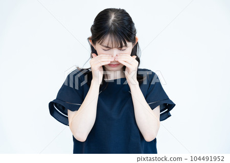 Middle-aged woman crying 104491952