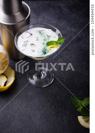 Cocktail or mocktail with lemon and mint Cocktail or mocktail with lemon and mint 104494458