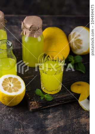 Traditional italian limoncello or lemon liquor Traditional italian limoncello or lemon liquor 104494475