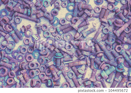 Abstract grunge metal background from old rusty bolts, screws, nuts and washers Abstract grunge metal background from old rusty bolts, screws, nuts and washers 104495672
