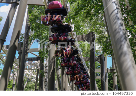 A sunny Hokkaido Rusutsu Resort roller coaster. plateau in summer A sunny Hokkaido Rusutsu Resort roller coaster. plateau in summer 104497330