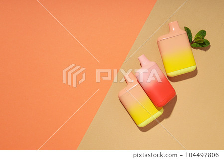 Smoking devices - electronic cigarette, concept of modern smoking Smoking devices - electronic cigarette, concept of modern smoking 104497806