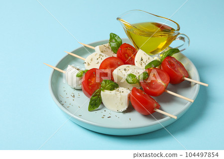 Concept of tasty Italian cuisine food - Caprese salad Concept of tasty Italian cuisine food - Caprese salad 104497854