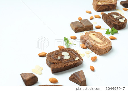 Concept of delicious sweet food - cake roll Concept of delicious sweet food - cake roll 104497947