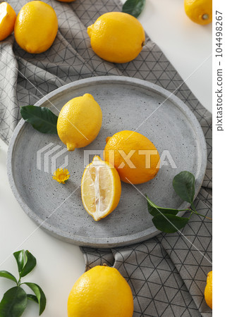 Concept of tasty citrus fruit - delicious lemon Concept of tasty citrus fruit - delicious lemon 104498267