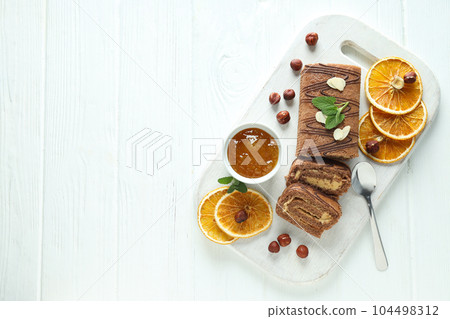 Concept of delicious sweet food - cake roll 104498312