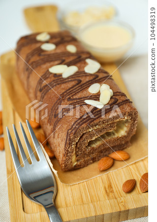 Concept of delicious sweet food - cake roll 104498319