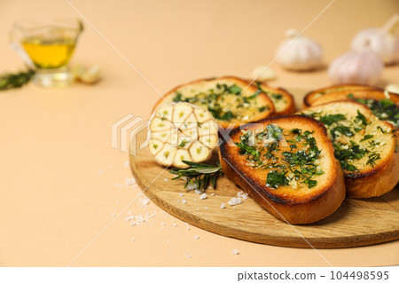 Tasty toasts with garlic, homemade products appetizer Tasty toasts with garlic, homemade products appetizer 104498595