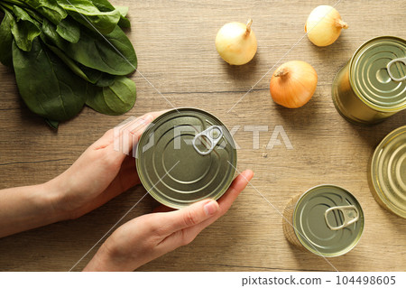 Canned food in blank metal jars, concept of canned food 104498605