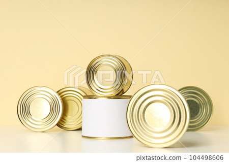 Canned food in blank metal jars, concept of canned food Canned food in blank metal jars, concept of canned food 104498606