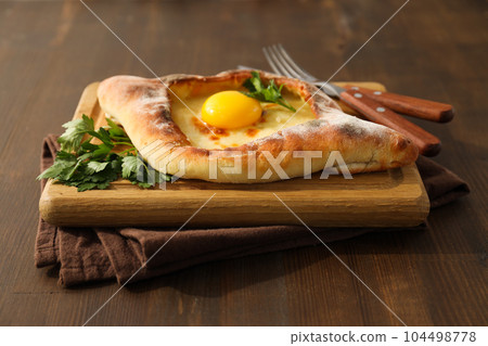 National Georgian cuisine food, flour product - Khachapuri 104498778