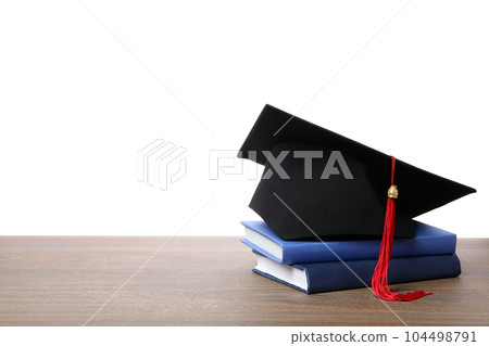 Concept of graduation, isolated on white background Concept of graduation, isolated on white background 104498791
