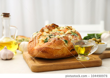 Tasty bakery product - garlic bread, homemade bread Tasty bakery product - garlic bread, homemade bread 104498978