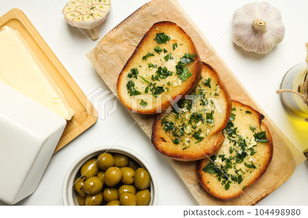 Tasty toasts with garlic, homemade products appetizer Tasty toasts with garlic, homemade products appetizer 104498980
