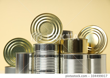 Canned food in blank metal jars, concept of canned food Canned food in blank metal jars, concept of canned food 104499017
