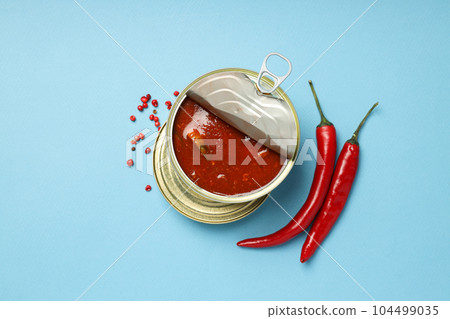 Canned food in blank metal jars, concept of canned food Canned food in blank metal jars, concept of canned food 104499035