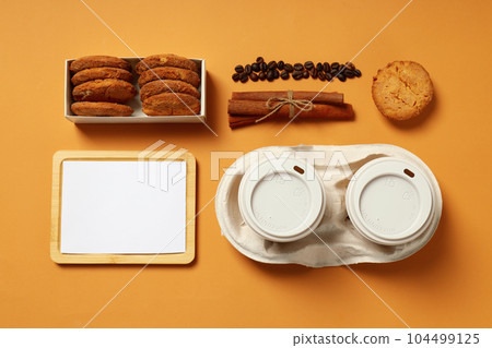 Mockup flat lay with different freelance accessories on beige background 104499125