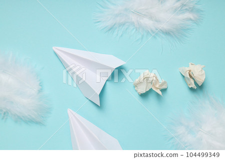 Business, startup and sponsorship concept with paper plane on blue background Business, startup and sponsorship concept with paper plane on blue background 104499349