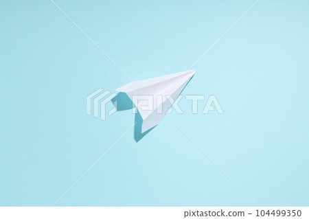 Business, startup and sponsorship concept with paper plane on blue background Business, startup and sponsorship concept with paper plane on blue background 104499350