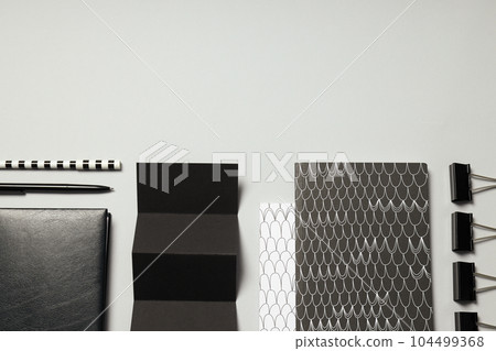 Mockup flat lay with different office accessories on light gray background Mockup flat lay with different office accessories on light gray background 104499368