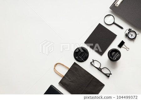 Mockup flat lay with different office accessories on white background Mockup flat lay with different office accessories on white background 104499372